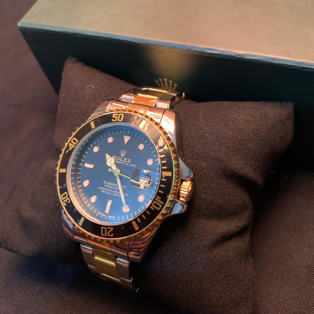 Rolex Submariner Date – Black Dial with Gold Accents (Two-Tone)