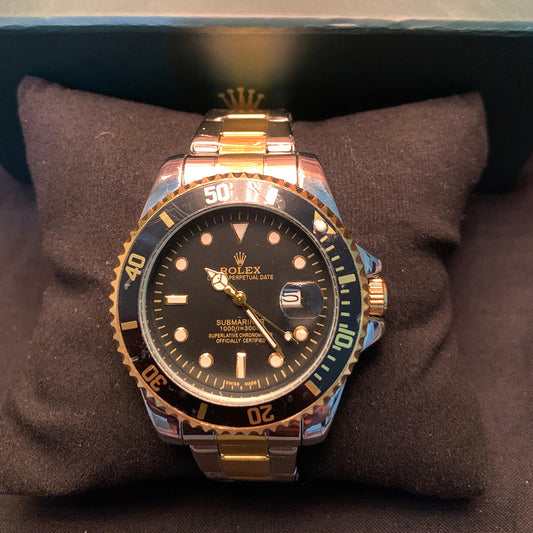 Rolex Submariner Date – Black Dial with Gold Accents (Two-Tone)